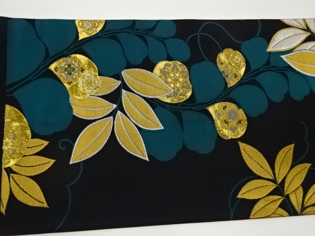  葉に華文模様織出し袋帯